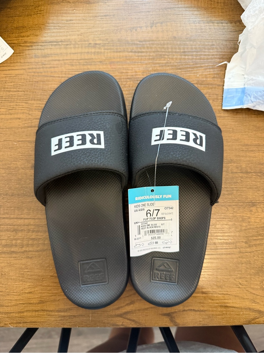 Reef Black Slide Sandals with White Logo